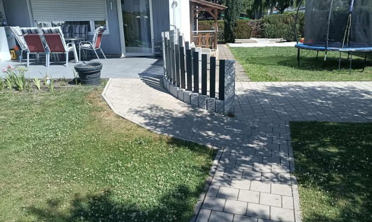 Pflasterarbeiten mit Basaltsteinen